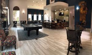 Apartments in West Houston, Texas - Clubhouse Billiards Area with View to Kitchen and Lounge Area