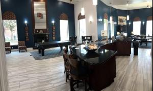 Apartments in West Houston, Texas - Clubhouse Kitchen & Lounge and Billiards Area